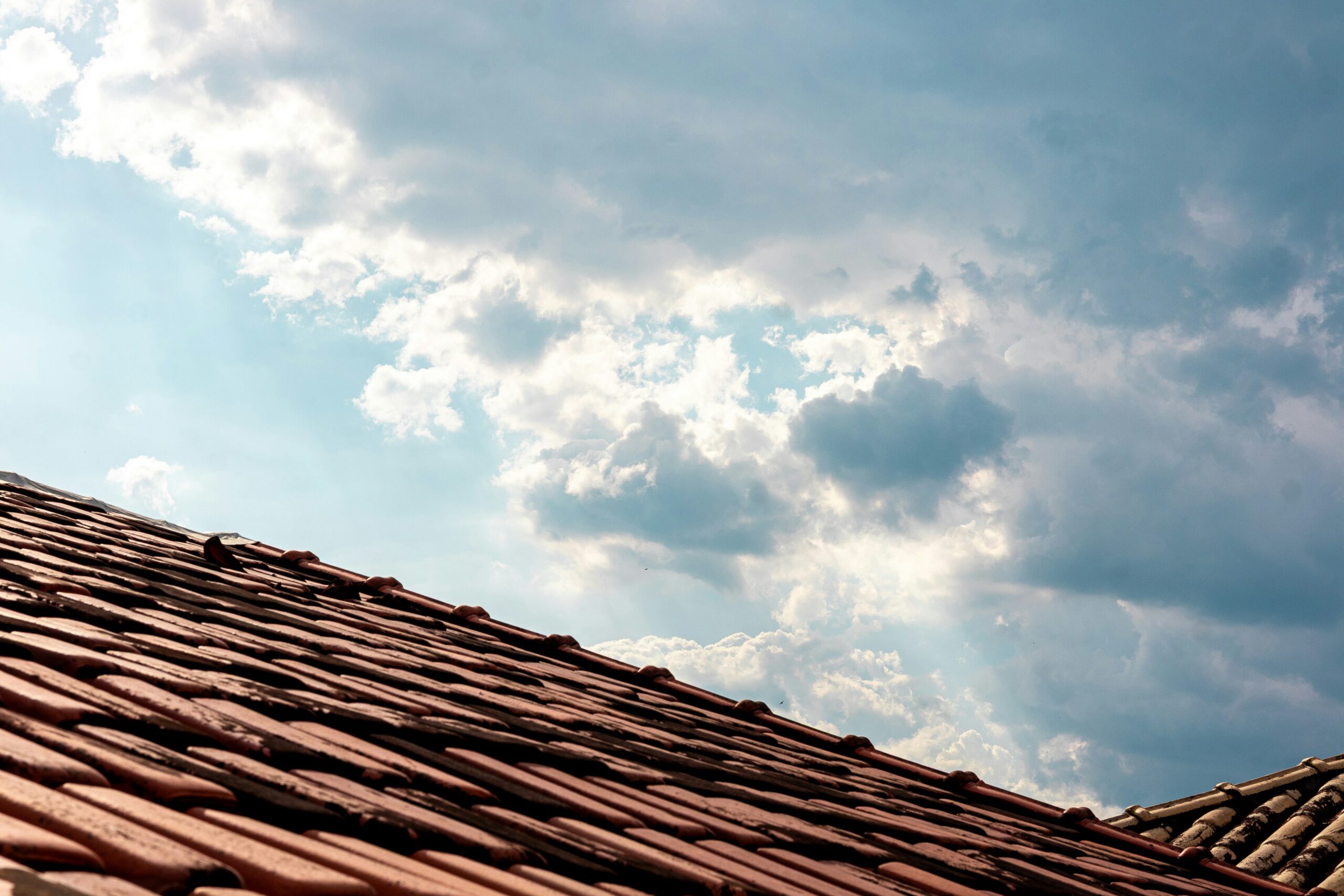 Severe weather looming over roof.